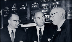 Eli M. Black, John M. Fox, and Robert Raymond at the New York Stock Exchange.